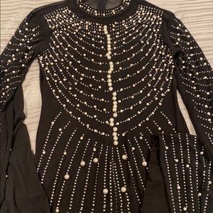 Jumpsuit w/ ivory pearls.